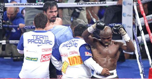 Bradley celebrates half-heartedly at the end of the bout