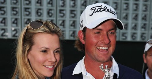 Webb Simpson celebrates his US Open win with his wife.