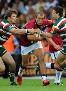Mark Jennings of Sale Sharks is tackled by Harry Wells R and John Hale of Leicester Tigers Mark Jennings of Sale Sharks is tackled by Harry Wells R and John Hale of Leicester Tigers
