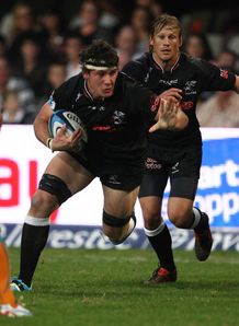 Sharks flank Marcell Coetzee going into contact Sharks flank Marcell Coetzee going into contact
