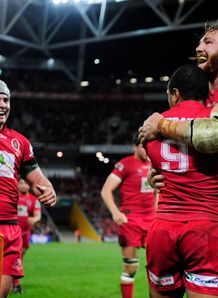 Will Genia of the Reds Scott Higginbotham and Liam Gill Will Genia of the Reds Scott Higginbotham and Liam Gill