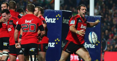 Adam Whitelock kicking the ball away in celebration Adam Whitelock kicking the ball away in celebration