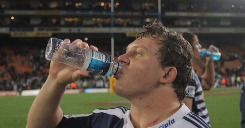 Deon Fourie having a drink Deon Fourie having a drink