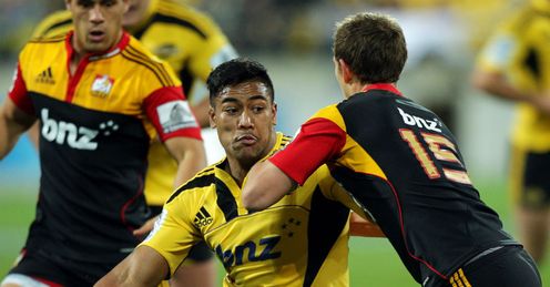 Julian Savea holds off Andrew Hurrell Hurricanes v Chiefs 2012 Julian Savea holds off Andrew Hurrell Hurricanes v Chiefs 2012