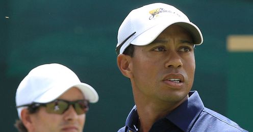 Defending champion Scott (L) and Woods will be in action in Ohio