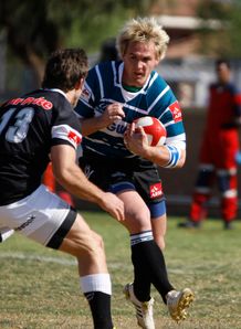 Marnus Schoeman taking contact for Griquas Marnus Schoeman taking contact for Griquas
