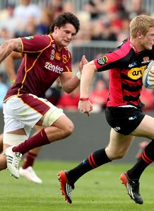 Scott McKee chasing Johnny McNicholl Scott McKee chasing Johnny McNicholl