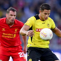 Jamie Carragher battles with Raul Bobadilla