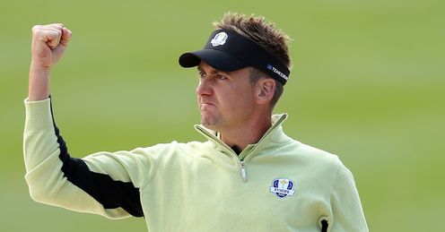 Poulter: Celebrates during his opening foursomes match