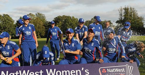 Champagne moment: England celebrate beating the West Indies