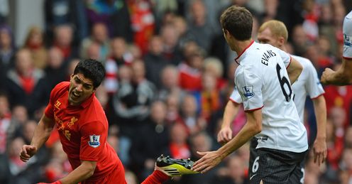 Luis Suarez: jumping before he is pushed?