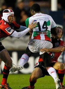 Taku Ngwenya of Biarritz C is tackled by Matt Giteau of Toulon L and Jonny Wilkinson of Toulon Taku Ngwenya of Biarritz C is tackled by Matt Giteau of Toulon L and Jonny Wilkinson of Toulon