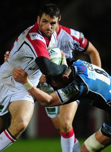 Ulster fullback Jared Payne l breaks the tackle of Glasgow number 8 Ryan Wilson