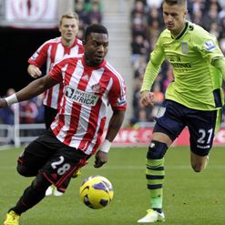 Stephane Sessegnon and Joe Bennett