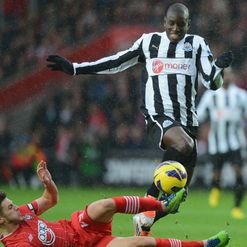 Adam Lallana tackles Demba Ba