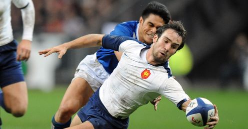France s scrum half Morgan Parra C vies with Samoan s winger David Lemi rear France s scrum half Morgan Parra C vies with Samoan s winger David Lemi rear