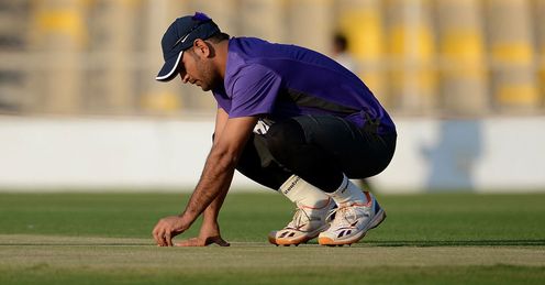 Mahendra Singh Dhoni: India's skipper inspects the pitch at The Sardar Patel Stadium