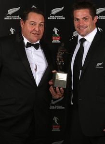 All Black coach Steve Hansen L and captain Richie McCaw pose with the Team of the Year award All Black coach Steve Hansen L and captain Richie McCaw pose with the Team of the Year award