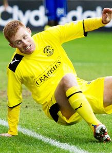 Kilmarnock and Hibernian served up a festive 1-1 draw in their SPL clash at a sodden Rugby Park