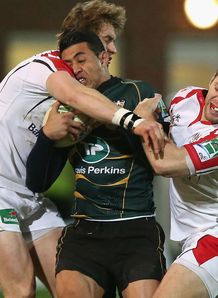George Pisi Northampton Saints tackled by two Ulster players Heineken Cup - round three George Pisi Northampton Saints tackled by two Ulster players Heineken Cup - round three