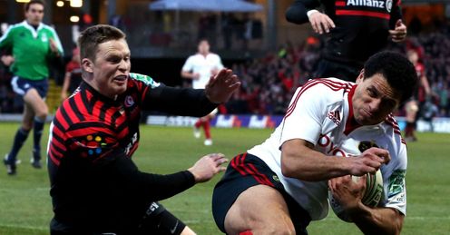 Doug Howlett of Munster outpaces Chris Ashton of Saracens Doug Howlett of Munster outpaces Chris Ashton of Saracens