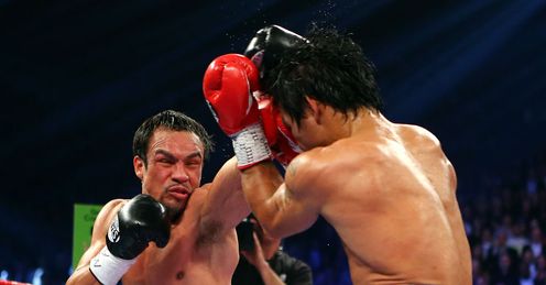 Marquez (left) defeated Pacquiao in their fifth clash in Las Vegas on Saturday