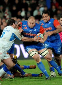 Grenoble s South African lock Naude Beukes vies with Castres defence Grenoble s South African lock Naude Beukes vies with Castres defence