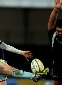 Lee Dickson clearing for Northampton under pressure from Hoani Tui of Exeter Lee Dickson clearing for Northampton under pressure from Hoani Tui of Exeter