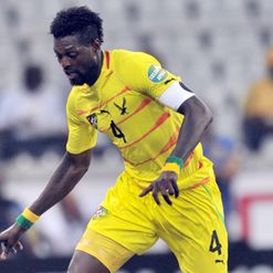 Adebayor: Upset with pitch quality