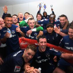 Oldham celebrate beating Liverpool