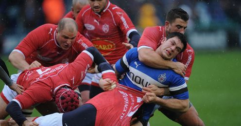 Francois Louw of Bath is tackled by Agen Francois Louw of Bath is tackled by Agen