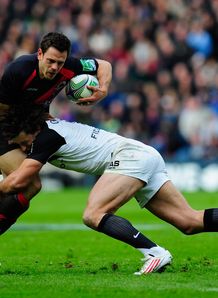 Edinburgh centre Nick de Luca tackled