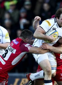 Henry Thomas of Sale is tackled by Paulica Ion of London Welsh