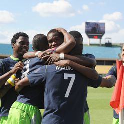 Malokase: Celebrates with team-mates