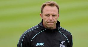 Adams defends Surrey record