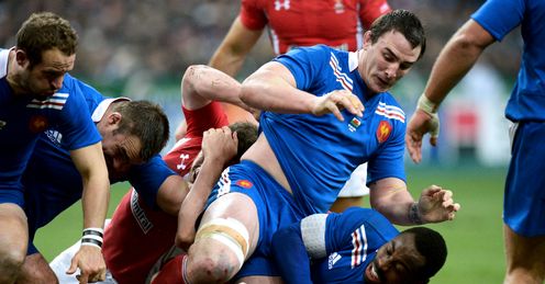 Louis Picamoles and Fulgence Ouedraogo right compete with Mike Phillips floor France v Wales Six Nations Stade de France Paris Louis Picamoles and Fulgence Ouedraogo right compete with Mike Phillips floor France v Wales Six Nations Stade de France Paris