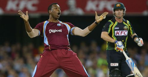 Kieron Pollard of the West Indies celebrates after dismissing Brad Haddin of Australia
