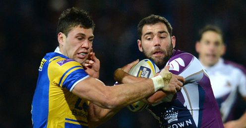 Leeds Rhino s Joel Moon L vies with Melbourne Storm s Cameron Smith Leeds Rhino s Joel Moon L vies with Melbourne Storm s Cameron Smith