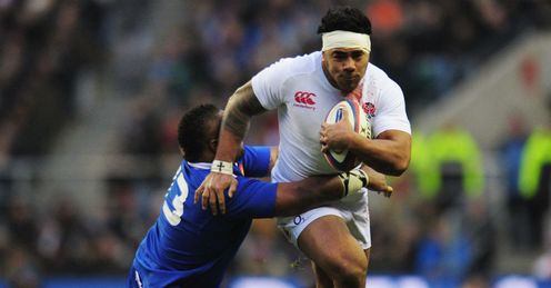Mathieu Bastareaud of France tackles Manu Tuilagi of England Mathieu Bastareaud of France tackles Manu Tuilagi of England