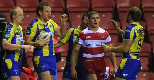 Joel Monaghan Warrington Wolves celebrating a try against Wigan Warriors Joel Monaghan Warrington Wolves celebrating a try against Wigan Warriors