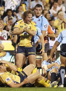 Dan Palmer of the Brumbies celebrates a try by Ben Mowen v Waratahs