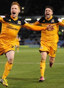 Championship: Hull go second after victory at Burnley