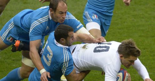 England s fly half Toby Flood R is brought down by Italy s centre Gonzalo Canale C England s fly half Toby Flood R is brought down by Italy s centre Gonzalo Canale C