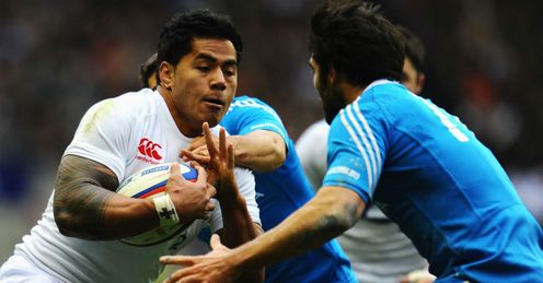 Luke McLean of Italy tackles Manu Tuilagi of England Luke McLean of Italy tackles Manu Tuilagi of England
