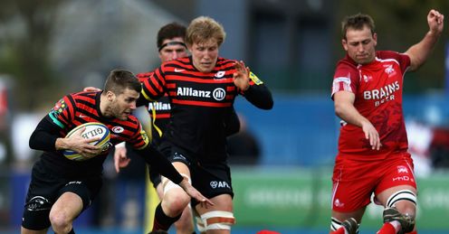 Richard Wigglesworth of Saracens beats the tackle from Tom Bristow of London Welsh Richard Wigglesworth of Saracens beats the tackle from Tom Bristow of London Welsh