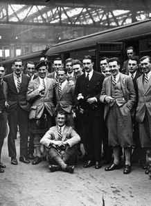 1924 - The British Rugby team on the platform at Waterloo ahead of their tour to South Africa. Centre is the captain Ronald Cove Smith with their mascot Felix 1924 - The British Rugby team on the platform at Waterloo ahead of their tour to South Africa. Centre is the captain Ronald Cove Smith with their mascot Felix