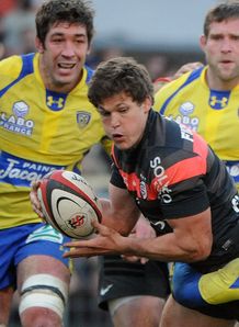 Toulouse s scrum half Luke Burgess 2ndL is tackled by Clermont Toulouse s scrum half Luke Burgess 2ndL is tackled by Clermont