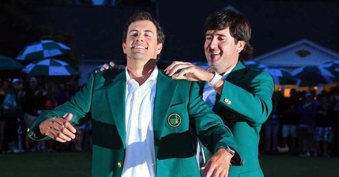 Adam Scott receives the coveted green jacket