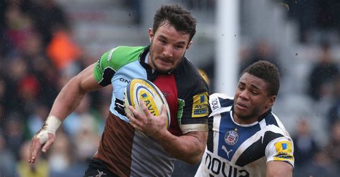 George Lowe of Harlequins races away from Kyle Eastmond of Bath George Lowe of Harlequins races away from Kyle Eastmond of Bath