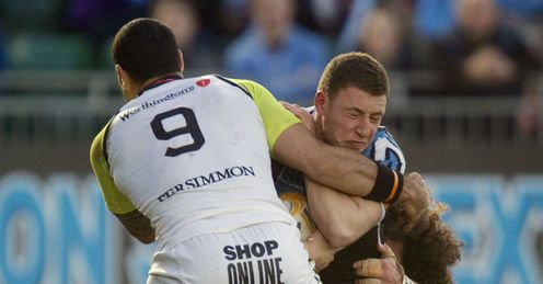 Glasgow fly half Duncan Weir right is shackled by Ospreys Kahn Fotuali i Glasgow fly half Duncan Weir right is shackled by Ospreys Kahn Fotuali i